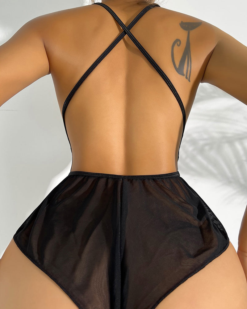 Body de encaje con escote profundo en V y transparencias