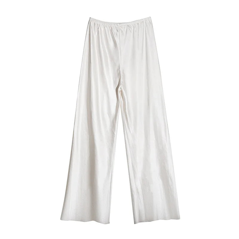 Calça feminina longa e ampla de cetim, estilo casual, ideal para o verão.