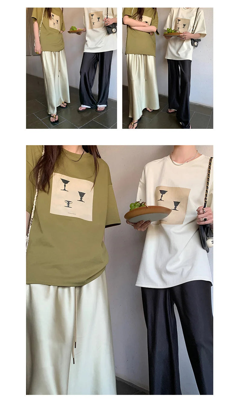 Calça feminina longa e ampla de cetim, estilo casual, ideal para o verão.