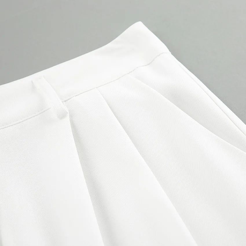 Pantalones blancos de mujer estilo lujo ligero