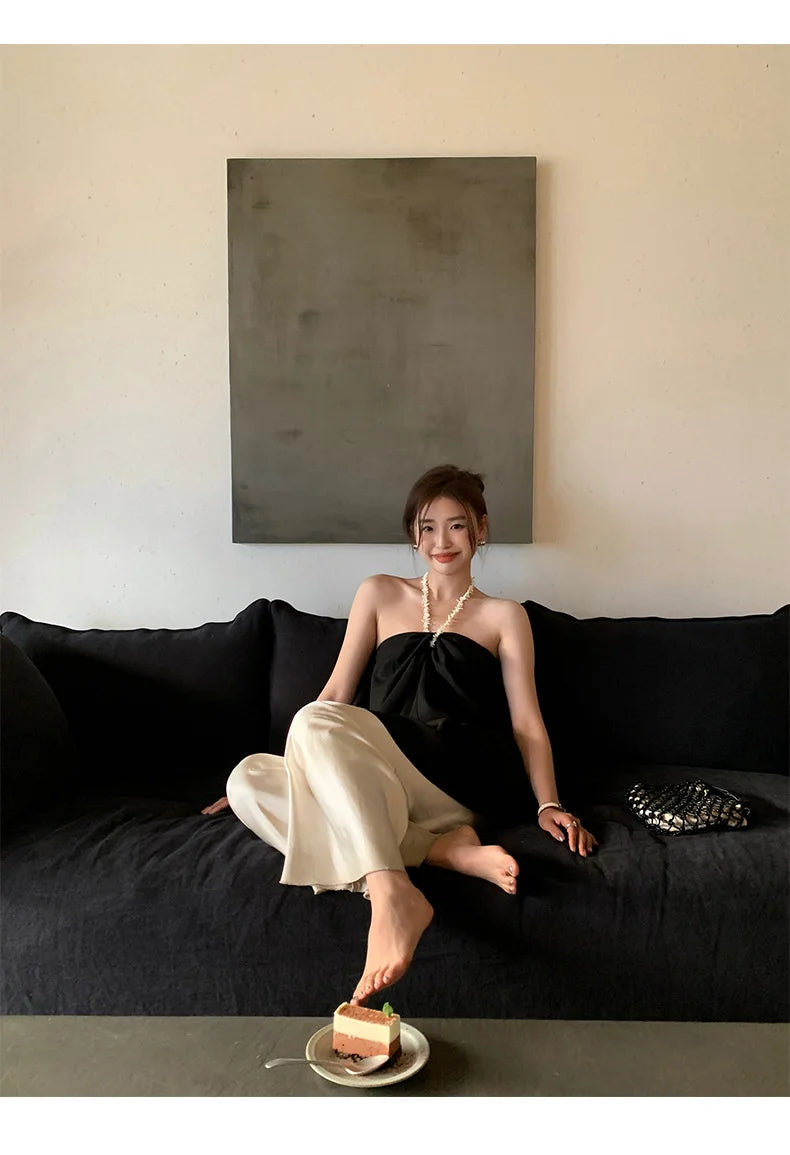 Calça feminina longa e ampla de cetim, estilo casual, ideal para o verão.