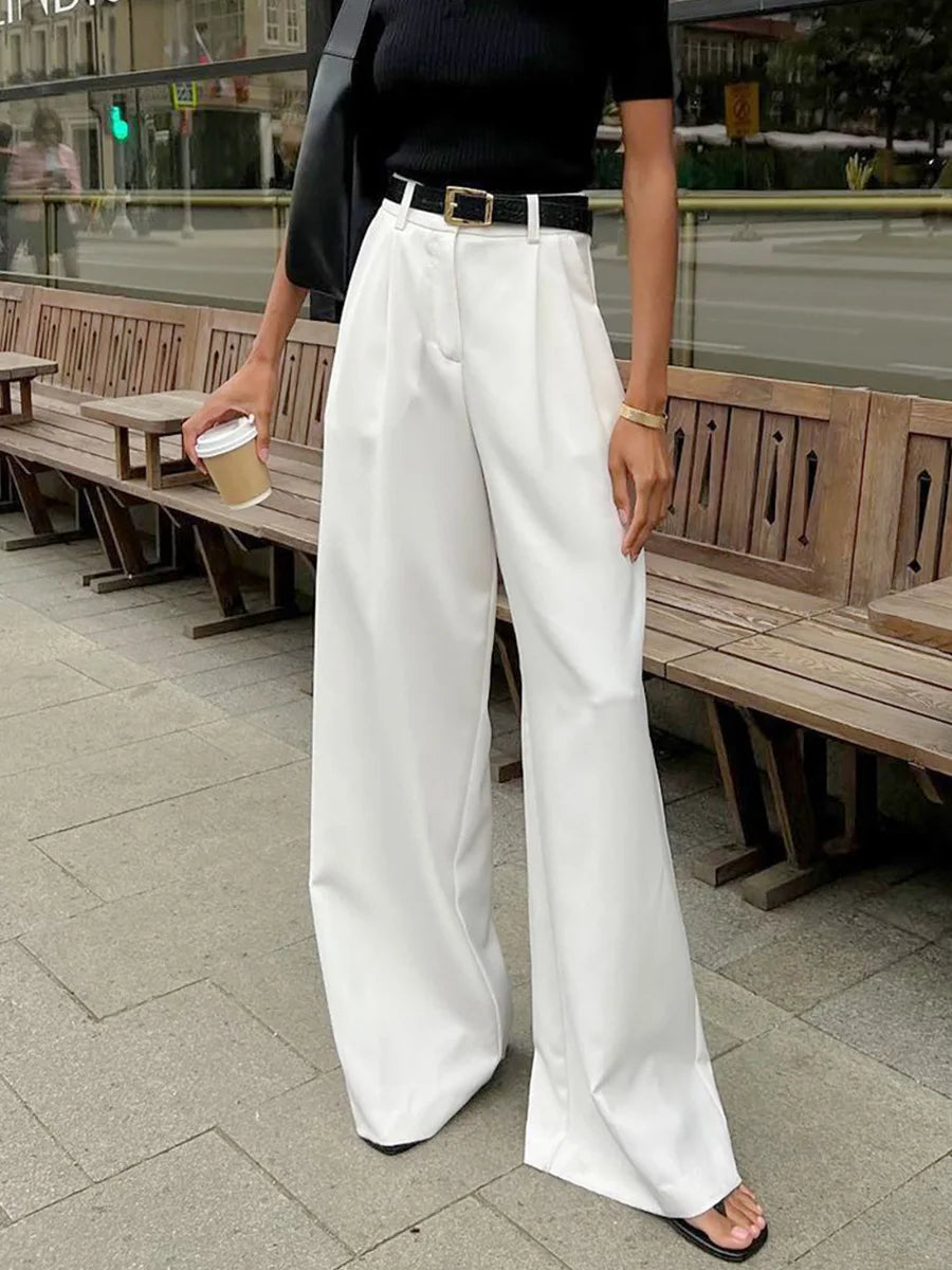 Pantalones blancos de mujer estilo lujo ligero